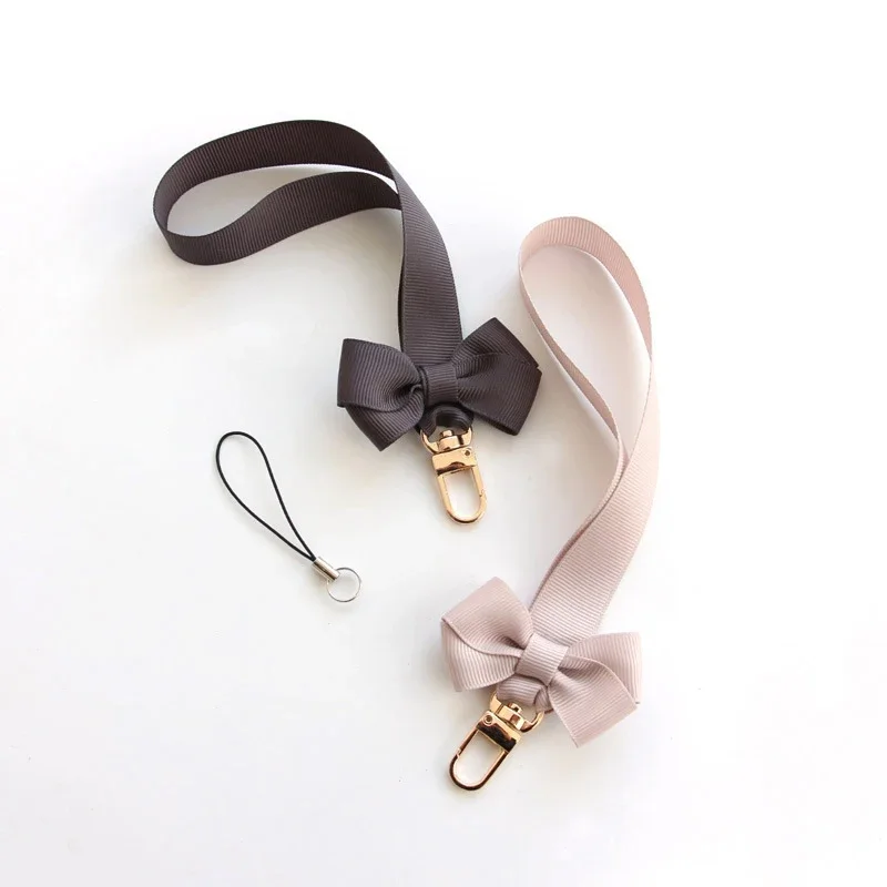 Trendy Bowknot Mobile Phone Ch - Fashion Women Picture 评论和价格