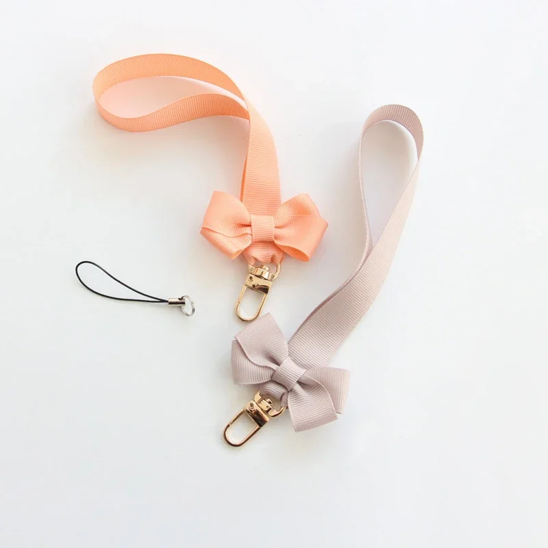Trendy Bowknot Mobile Phone Ch - Fashion Women Picture 评论和价格